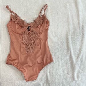 charlotte russe pink - peach body suit in XS ! RUNS VERY SMALL & TIGHT. PETITE